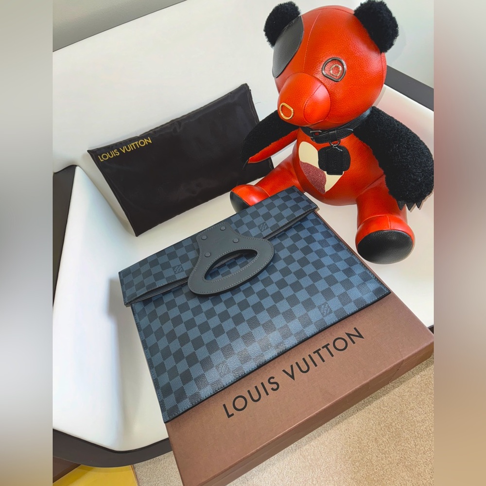 100% Authentic with Tags and Badges Louis Vuitton Clutch 
Cobalt Blue Monogram